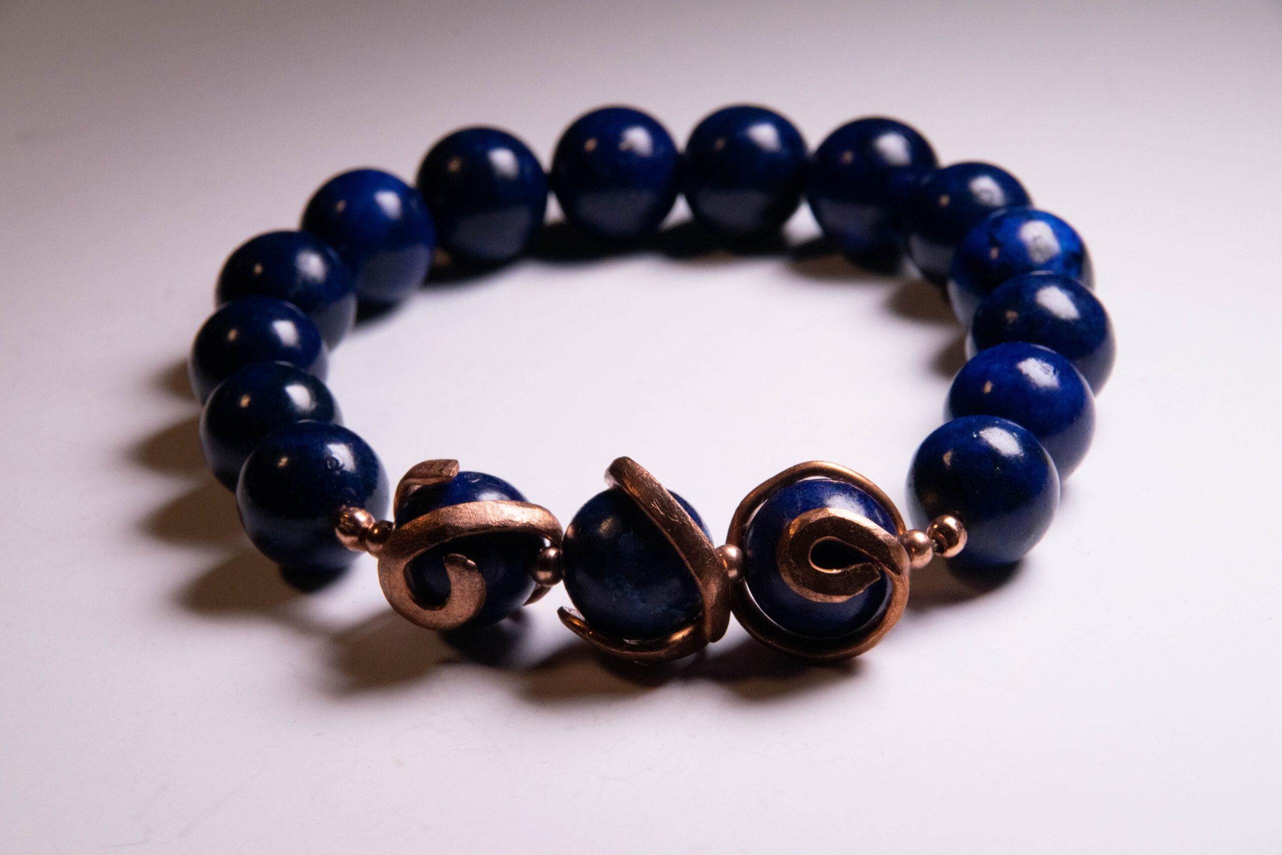 blue lapis lazuli bracelet with copper accents
