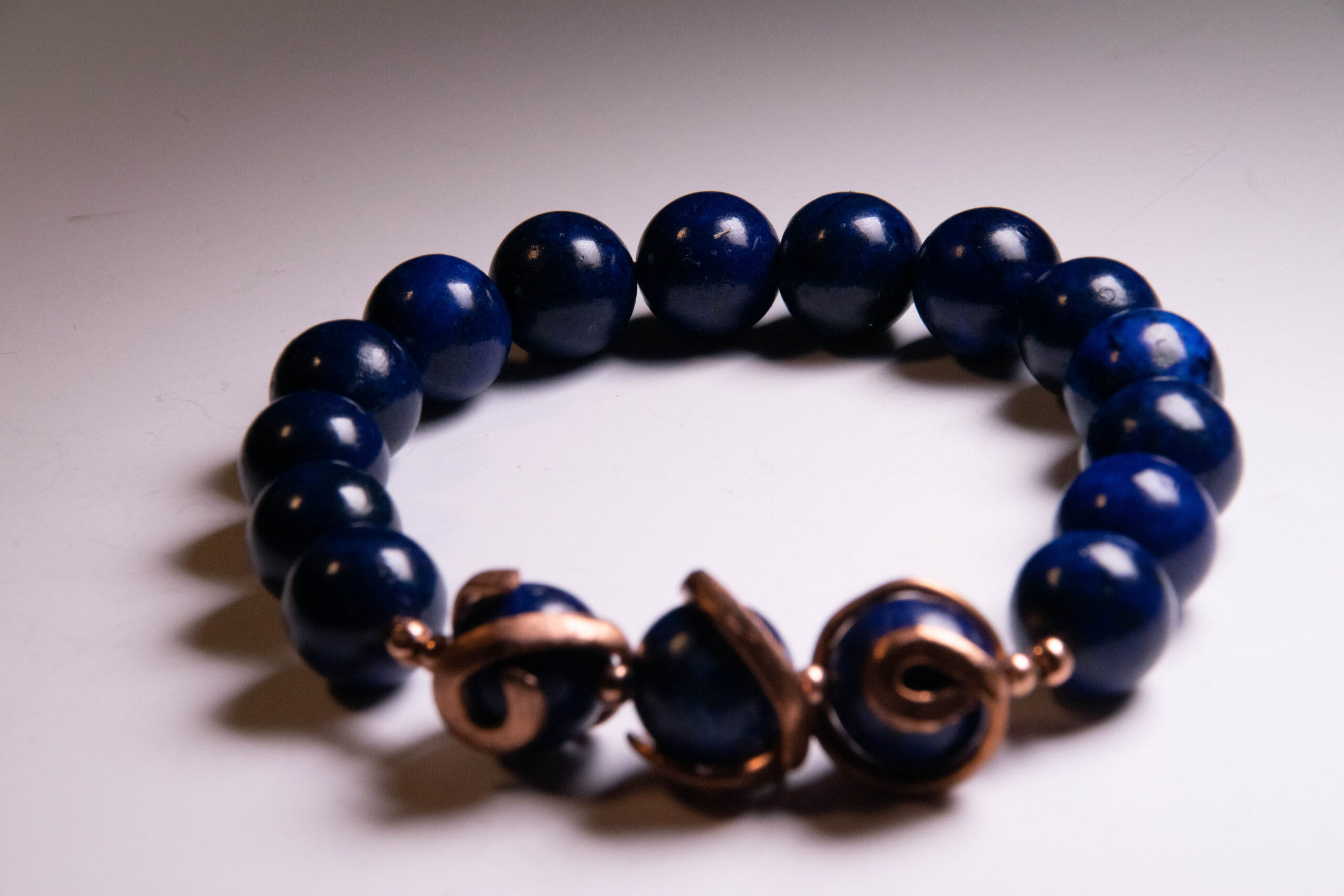 blue lapis lazuli bracelet with copper accents